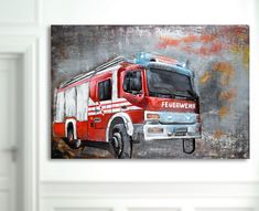 a painting of a firetruck is hanging on the wall in an empty room