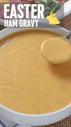 a spoon is being used to dip into a bowl of soup with the words, easter ham gravy