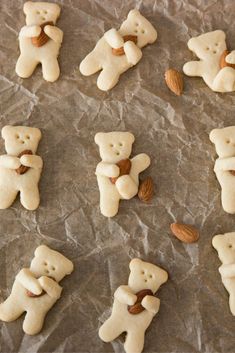 several cookies shaped like teddy bears with nuts