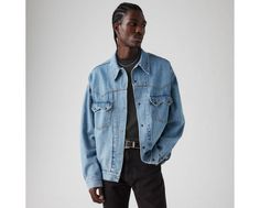 We took our iconic Trucker Jacket and gave it a Western upgrade. With a casual, relaxed cut, this Western Trucker Jacket features a classic button-up front, pointed flap pockets and defined yoke detailing. A western-inspired Trucker Jacket Cut with a relaxed fit Finished with pointed flap pockets and defined yoke detailing Western Style Long Sleeve Workwear Outerwear, Western Style Long Sleeve Outerwear With Pockets, Western Style Workwear Outerwear, Western Long Sleeve Outerwear With Pockets, Western Style Long Sleeve Outerwear For Work, Fitted Western Outerwear With Pockets, Classic Denim Jacket With Lapel Collar For Fall, Classic Single Breasted Relaxed Fit Shacket, Classic Single Breasted Shacket With Relaxed Fit