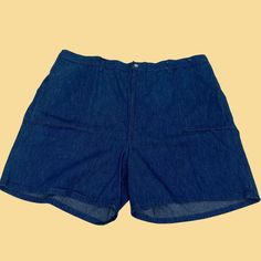 Vintage denim shorts, manufactured ca. 1970s, still with the original tags attached. Moonshine (Lane & Bryant) brand plus size women's shorts in size 44 (could be worn fashionably by either gender today).     - Brand: Moonshine (Lane & Bryant)    - Size: Size 44    - Time Period: 1970s    - Color(s): Denim blue    - Materials: 100% cotton    - Made in: Made in USA    - Condition: In new old stock, vintage condition with original tags (this piece was stored in a dresser after purchase and never w Retro Wide Leg Cotton Shorts, Retro Denim Bottoms With Built-in Shorts, Retro Short Denim Shorts, Retro High Waist Denim Shorts, Retro High-waist Denim Shorts, Retro High-waisted Jean Shorts With Built-in Shorts, Retro High Waist Jean Shorts With Built-in Shorts, Retro Cotton Cutoff Shorts, Retro Denim Jean Shorts With Built-in Shorts