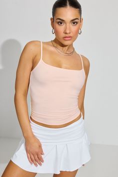 What's the scoop? Features - Fixed shoulder straps - Scoop neckline - Stretchy Size & Fit - Fit: Fitted - Length: Cropped Materials & Care - Content: 80% nylon, 20% spandex - Machine wash, cold - Imported Garage Tank Tops, Black Cami Top, Pink Tank Top, Cami Top, Trouser Pants, Cami Tops, Christmas List, Scoop Neckline, Shoulder Straps