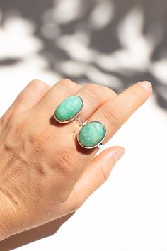 This beautiful Chrysoprase ring is a colourful statement piece to add to your jewellery collection. The ring is made using 925 sterling silver. Available in size 8 1/4. Dimensions: Total height: 23mm Total width: 15mm Stone height: 20mm Stone width: 12mm Stone + bezel thickness: 9mm Band width: 4mm - Please note - * Additional photos and videos available on request * Go to 'About us' section for links to our socials and website * Only the ring from second picture is included in the price. * Gemstones are natural material, they can slightly differ in color, size, shape and may show some inclusions or cracks inside the stone itself. We do take great care in picking the best quality stones for best quality jewellery. Oval Amazonite Jewelry As Gift, Oval Amazonite Jewelry Gift, Oval Amazonite Jewelry For Gift, Chrysoprase Jewelry With Large Stone For Gift, Jade Ring With Natural Stones, Jade Jewelry With Natural Stones, Oval Emerald Ring With Natural Stones In Sterling Silver, Sterling Silver Emerald Ring With Large Stone As Gift, Gift Emerald Ring With Large Stone In Sterling Silver