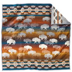 Majestic buffalo (American bison) roam freely across this softly napped throw, just as they do in Yellowstone National Park. On premium fabric woven in our Northwest mills, earthy tonal browns meet rusty red and blue for a vibrant yet calming design. The soft, napped texture makes it perfect for snuggling in on winter nights or for draping over your armchair. Napped, felt bound 64" x 64" Pure virgin wool/cotton Dry clean Made in USA Pendleton Throw, Pendleton Blanket, American Bison, Grey Throw, Saddle Blanket, Crib Blanket, Pendleton Wool, Rush Hour, Resting Place