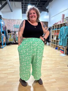 You guys loved the first iterations of these fun pleated Elyse Pants so here we are again with a super fun green and white floral options! Cut in our Elyse pant style these are a statement and also super comfy with a wide elastic waistband and POCKETS. *These cuties are made to order so please allow a little extra time for shipping- approximately 2-3 weeks from order date.* Green Wide Leg Pants With Elastic Waistband For Loungewear, Casual Green Wide Leg Pants For Spring, Spring Green Bottoms For Day Out, Green Bottoms For Spring Day Out, Green Bottoms With Elastic Waistband For Spring, Casual Green Harem Pants For Summer, Green Ankle-length Pants For Spring, Green Ankle-length Wide Leg Pants For Spring, Trendy Green Ankle-length Wide Leg Pants