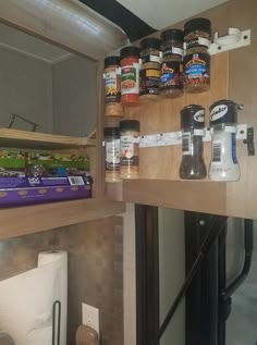 spices and condiments are stored on the shelf