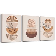 three canvases with different shapes and designs on each one, two are beige and one is brown