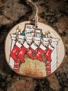 a wooden ornament with stockings hanging from it