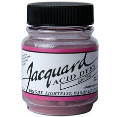 a jar of pink acrylic paint with black lid