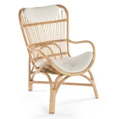 the chair is made out of bamboo and has a white cushion