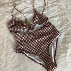 Super Cute Checkered Swimsuit Styled With A Pretty Front Tie In A Reddish Brown. Adjustable Shoulder Straps. New With Tags. Note On Sizing: Topshop’s Us 4 Size Fits More Of A Us 0-2. Checkered Swimsuit, Swimsuit Fashion, Reddish Brown, Red Brown, Womens Swim, Shoulder Straps, One Piece Swimsuit, Gingham, Topshop