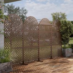 a wooden deck with a privacy fence on it