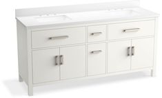 a white double sink vanity with two faucets on the top and drawers below