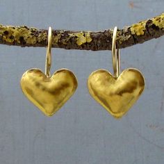 Handmade and crafted with care , 22k solid gold "puffy" hearts earrings  The back of the earrings is made of 9k yellow gold. Handmade 14k yellow gold locking French wires. Earrings Width - 0.53''( 13.5 mm). Length without the ear wire - 0.47" (12 mm). Length from top of the ear wire to bottom of the earring - 0.88" (22.5 mm). The earrings will be packed in a gift box ready to give as a gift. The earrings will be shipped with DHL that usually takes 2-6 days to arrive. Please contact me with any questions or requests. Classic Gold Earrings For Valentine's Day, Valentine's Day Yellow Gold-plated Earrings, Everyday Gold Heart Pendant Earrings, Gold Heart Charm Earrings Gift, Gold Sterling Silver Earrings With Heart Charm, Gold Earrings With Heart Charm As Gift, Yellow Gold Heart Charm Earrings For Gift, Handmade Elegant Double Heart Earrings, Gold Earrings With Heart Charm For Gift