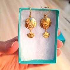 Gold Sand Dollar Shell And Turquoise Bead Earrings, New In Box Turquoise Nickel-free Beaded Earrings For Beach, Turquoise Dangle Beaded Earrings For Gift, Turquoise Beaded Dangle Earrings For Gift, Turquoise Jewelry With Matching Earrings For Beach, Sand Dollar Shell, Turquoise Bead Earrings, Gold Sand, Sand Dollar, Bead Earrings