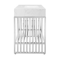 a white marble side table with metal bars on the sides and a square sink in the middle