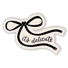 a sticker with the words it's delicate in black and white lettering that reads,