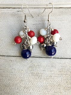 Fourth of July earrings, patriotic earrings for women to celebrate Memorial day, 4th of July, Flag day, Veterans day or Independence day. Wear these bright and colorful well made earrings to a special formal event or dress them down for a more casual look. Earrings are uniquely beaded & neatly wrapped on top of each bead for added detail and quality.  4th of July earrings are READY TO SHIP!!  Ship time is 3-5 business days. Free tracking.  RED, WHITE & BLUE https://www.etsy.com/shop/MiksJewelryS Patriotic Blue Earrings For Independence Day, Blue Patriotic Earrings For Independence Day, Patriotic Earrings For 4th Of July, Patriotic Drop Earrings For 4th Of July, Patriotic 4th Of July Earrings, Patriotic Multicolor Dangle Jewelry, Patriotic Dangle Earrings For Independence Day, Patriotic Dangle Jewelry For Independence Day, Patriotic Nickel-free Jewelry For 4th Of July