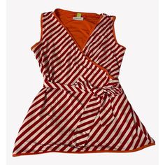 This Versatile Wrap Top From Serra Is Reversible, Offering Two Stylish Looks In One. Size Is Medium 8-10 Ideal For Casual Outings Or A Chic Office Look. Great For Spring, Summer Or Wear With A Cardigan For Fall! Condition Is New With Tags And Package, But Has Been Opened (As Shown In Photos) Sleeveless Design Reversible: Solid Orange Or Red & White Stripes Wrap Style With Belt Soft And Breathable Fabric Machine Washable Features: Casual Machine Wash, Tumble Dry Size: Womens Medium Condition Is N Stretch Sleeveless Lined Tops, Spring Sleeveless Lined Top, Red White Stripes, Solid Orange, Office Look, Chic Office, Red And White Stripes, Wrap Top, Orange Red