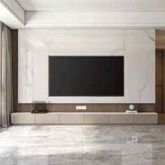 a large flat screen tv mounted to the side of a wall in a living room