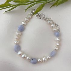 The 'Angelia' beaded bracelet in blue lace agate. Handmade with love, these high-quality bracelets are made with natural blue lace agate crystals and delicate AAA grade freshwater pearls.  All findings are sterling silver plated. Approximately 7 inches, excluding the 1.5-inch extender chain, message if you need a custom size.  ✯Packaged with care in a white organza bag ✯ The perfect gift for yourself or a loved one ✯ Items are all slightly unique as they are handmade to order ✯ To keep it in the Diy Bracelet Designs, Jewellery Gifts, Crystal Beads Bracelet, Pearl Crystal, Handmade Jewelry Gift, Agate Crystal, Blue Lace Agate, Bracelet Silver, Lace Agate