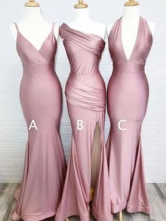 three bridesmaid dresses on mannequins in front of a brick wall