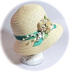 "A big girls cream colored cloche style hat with a lush bouquet of vintage flowers in cream and pale pink with sea foam green velvet. The bouquet rests on the side of the hat and measures 21\". To view my entire collection of Girl's Hats click on this Section.... https://www.etsy.com/your/shops/Marcellefinery/sections/16935555 Previous patrons of my shop have honored me with their comments Thank you so much for this beautiful hat and making it adjustable for my 2 yr.old daughter!! I received it already a couple of weeks ago and she's been wearing it almost daily since :-) Thank you so much for your kindest service and I'm looking forward to seeing your beautiful creations in the future too! This hat is so adorable. I love it. It is so elegant not over done but just perfectly decorated to m Cream Brimmed Mini Hats For Garden Parties, Vintage Green Mini Hat With Short Brim, Vintage Green Hat For Wedding, Green Vintage Mini Hat With Short Brim, Kentucky Derby Cream Bucket Hat, Vintage Green Wedding Hat, Vintage Mini Hats For Spring Garden Party, Vintage Hat With Flower For Garden Party, Vintage Cream Sun Hat With Adjustable Fit