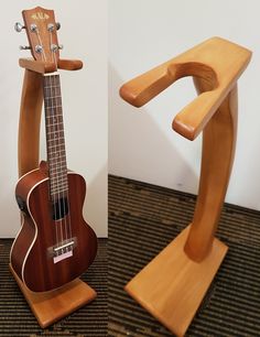 a wooden guitar stand with an acoustic guitar