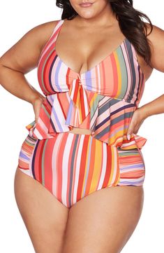 Bring the drama in this brightly striped tankini bikini top meant to support you comfortably on your next beach day with a flouncy peplum hem. Adjustable straps   Removable soft cups   82% recycled nylon, 18% elastane   Hand wash, dry flat   Imported Orange Swimwear, Striped Tankini, High Waisted Briefs, Plus Size Swimsuits, Peplum Hem, The Drama, Swimsuit Cover Ups, Full Figured, Swimsuit Cover