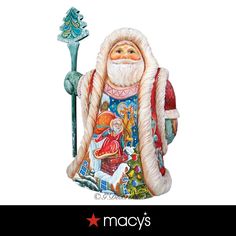 a santa claus figurine with a christmas tree in the background and text that reads, may's