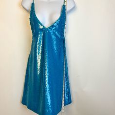 Excellent Condition No Sequins Missing No Loose Sequins, Fully Lined Statement Dress! Sold Out At Saks. Originally $495. #Ganni #Statementdress #Lilblackdress #Vegas Blue Sequin Knee-length Dress, Blue Knee-length Sequin Dress, Blue Knee-length Mini Dress With Sequins, Turquoise Knee-length Party Dress, Blue Sequin Mini Dress, Lil Black Dress, Statement Dress, Sequin Mini, Sequin Mini Dress