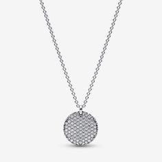 Let your sparkle do the talking with our Pandora Timeless Pavé Round Pendant Necklace. Featuring a medallion-inspired disc covered with 89 clear cubic zirconia, this sterling silver necklace is perfect for all those that love to shine bright. All of the stones face outward and even the edge of the medallion is encrusted for a three-dimensional effect. The back of the disc features an engraving of the Pandora logo. Let your love for sparkle shine with this unique piece or gift it to the person th Pandora Logo, Pandora Necklace, Bracelet Pandora, Round Pendant Necklace, Round Pendant, Pandora Jewelry, High Quality Jewelry, Pure Silver, Pandora Charms