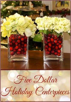 three vases filled with flowers and berries on top of a table next to a christmas tree