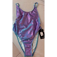 Brand New Fashion Nova Standout Metallic Swimsuit Summer Festival Stretch Leotard, Purple One-piece Party Swimwear, Summer Beachwear Party Leotard, Fitted Purple Bodysuit For Poolside, Trendy Purple Bodysuit For Party, Trendy Purple Party Bodysuit, Summer Purple Bodysuit For Night Out, Purple Summer Bodysuit For Night Out, Purple Bodysuit For Summer Nights