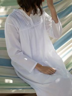 These white cotton nightgowns (long-sleeve and short-sleeve) are just right to wear around the house with a touch of class and comfort. Curl up to read a spooky story, lounge around the house in the evening, or wear it while celebrating the holidays. Cotton nightgowns make great pajamas any time of the year, and we hope they make you feel lovely. Mother's day gift ideas, mother's day inspo. White Cotton Nightgown, Longest Day Of The Year, Cotton Nighties, White Nightgown, Cotton Nightgown, Long Sleeve And Shorts, Spring Fever, Nightgowns, Night Gown