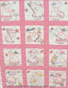 a pink quilt with many different embroidered pictures on the front and back, along with flowers