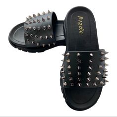 Metallic Spikes With Black Strap Warm Weather, Summer, Flip Flops/ Sandals/ Flats/ Slides Durable Rubber Sole Available Sizes 6, 8 Edgy Black Sandals With Studs, Edgy Black Studded Sandals, Black Edgy Sandals With Spikes, Casual Spiked Sandals For Party, Party Sandals With Spikes, Casual Party Sandals With Spikes, Black Flat Sandals With Spikes, Black Spiked Sandals For Spring, Edgy Black Sandals For Streetwear