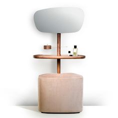 a round stool with a shelf on it next to a mirror and other items in the background