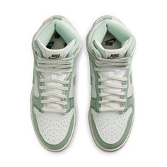 Celebrate heritage with an updated version of the Dunk High, recrafted to reflect the original from 1985. Matching the shape, look and feel that started it all, it delivers true vintage style while keeping the familiar comfort you love.Upper ages to soft perfection and features a durable construction reminiscent of '80s b-ball.Padded, high-top collar brings you old-school appeal that's rooted in comfort.Rubber outsole with classic hoops pivot circle adds traction and heritage style. Style # DV11 Nike Dunk High 1985, Dunk High 1985, Nike Kicks, Nike High Tops, Nike High, Nike Models, Popular Sneakers, Nike Dunk High, Dunk High