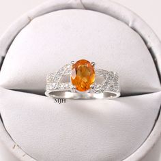 "Handmade Gemstone: Natural Citrine This ring features a 6x8 mm oval cut Natural Citrine and 925 sterling silver finished with rhodium. It is made by hand. Product Description Main stone: Natural Citrine Metal type: 925 sterling silver finished with rhodium Rhodium nickel free Made In : Jaipur Rajasthan Payment Policy------------------------------ we accept payment through PayPal only, Payment should be made within 3 days of purchase. .Delivery Time------------------ Item will be Shipped Within Silver Citrine Topaz Ring With Prong Setting, Hallmarked Citrine Rings, Formal Silver Citrine Crystal Ring, Luxury Silver Citrine Rings, Yellow Citrine Hallmarked Rings, Blue Aquamarine Ring, Green Tourmaline Ring, Smoky Quartz Ring, Rutilated Quartz Ring