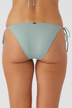 The beach is waiting. This is a solid color bikini bottom that has a classic side tie design and medium rear coverage fit. O'Neill Women's bikini bottom Saltwater Solids Collection Medium coverage Adjustable side ties O'Neill Blue: 85% Recycled Polyamide 15% Elastane Tactel | O'Neill Women's Saltwater Solids Maracas Tie Side Bottoms in Silver Blue, Size XL, Elastane/Polyamide Solid Swimwear With Drawstring For Sunbathing, Solid Color Triangle Top Swimwear With Drawstring, Summer Beach Bottoms With Side Ties, Tie-side Beachwear Bottoms, Solid Color Swimwear With Drawstring For Beach Season, Solid Swimwear With Drawstring For Beach Season, Swimwear With Moderate Back And Tie-side Bottom For Poolside, Blue Beach Bottoms With Side Ties, Beach Bottoms With Side Ties