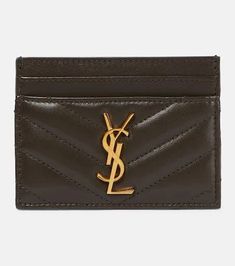 Made from matelassé leather, the Cassandre card holder is completed with signature monogram in gold. One of the most famous symbols in fashion, the YSL monogram consists of the intertwined initials of Saint Laurent's founder..Internal details: leather lining.Material: leather.Comes with dust bag.Comes with a box.Made in Italy.Height 7,5cm-3'.Width 10,5cm-4' Saint Laurent Bags, Leather Card Holder, Saint Laurent Bag, Card Holder Leather, Personal Shopping, Women's Bags, In Fashion, Bags Women, Saint Laurent