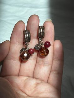 "Vintage, bead, dangle, earrings. The top of earrings are made of copper. Bead colors are maroon and amber brown.   Great, drop, hanging, earrings.  For pierced ears.  Colors are hues of browns and bronze. In good condition.  ** No returns or refunds.  measurements: 1 1/8\" L" Vintage Pierced Drop Beaded Earrings, Vintage Festival Earrings With Dangling Beads, Vintage Nickel-free Drop Beaded Earrings, Nickel-free Vintage Drop Beaded Earrings, Bohemian Earrings With Dangling Charms, Vintage Beaded Dangle Earrings, Vintage Dangle Beaded Earrings For Festival, Vintage Beaded Earrings With Dangling Round Beads, Vintage Dangle Beaded Earrings