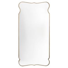 a white and gold framed mirror on a wall