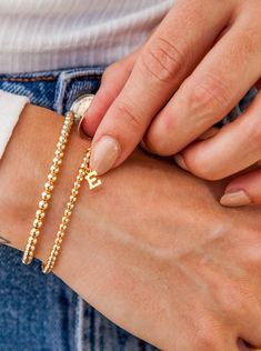 Customize your very own leMel Everyday Stretch bracelet with our gold fill letter charms on our best-selling 3mm stretch bracelets. Everyday Stretches, Pyrite Bracelet, Letter Bracelet, Initial Bracelet, Initial Jewelry, Dainty Bracelets, Childrens Jewelry, Name Bracelet, Layered Bracelets