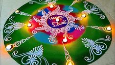 this is an image of a colorful rangdi with candles