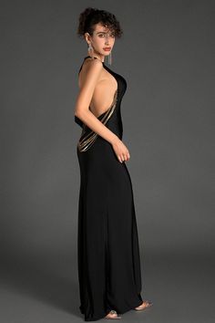 Step into the spotlight with our one shoulder backless chain dress. This maxi dress features an alluring one-shoulder design and a daring backless silhouette, complemented by a stylish chain detail that adds a touch of edginess. The elegant draping and fitted cut enhance your natural curves, making you feel both confident and glamorous. It's ideal for upscale events, evening parties, and red carpet occasions. Handmade customization Fabric composition: 90% polyester fiber, 10% spandex Washing met Elegant Low Back Maxi Dress For Party, Low Back Backless Dress For Prom Evening, Prom Season Evening Backless Low Back Dress, Prom Season Evening Backless Dress With Low Back, Backless Sweep Train Dress For Prom, Black Low Back Maxi Dress For Evening, Black Low-back Maxi Dress For Evening, Evening Maxi Dress With Cutout Back, Elegant Maxi Dress With Cutout Back For Evening