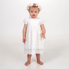 Elegant Spring Baptism Dress With Broderie Anglaise, Elegant Broderie Anglaise Baptism Dress For Spring, White Baptism Dress For Spring Garden Party, Elegant White Baptism Dress With Broderie Anglaise, Lace Baptism Dress With Broderie Anglaise, Spring Baptism Dress With Lace Bodice For First Communion, Summer Wedding First Communion Dress With Short Sleeves, White Baptism Dress With Broderie Anglaise, White Baptism Dress With Broderie Anglaise For Summer