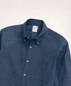 The Instagram-friendly Regent Chambray Sport Shirt. Stylish yet comfortable enough for all your posts with its incredibly soft 100% cotton chambray, classic button-down collar and chest pocket. Fit for everyday wear with its regular tailored cut that flatters any body type. Pair it with jeans, shorts or khakis alike - this wardrobe essential is perfect for all your adventures, both on and offline. Classic Chambray Top With Buttons, Classic Solid Color Shirt For Casual Gatherings, Classic Collared Shirt For Casual Gatherings, Classic Shirt With Buttoned Pockets For Everyday, Classic Fitted Shirt With Buttoned Pockets, Fitted Chambray Shirt With Button Closure, Chambray Shirt With Buttons And Relaxed Fit, Classic Button-up Shirt For Everyday, Relaxed Fit Chambray Shirt With Button Closure