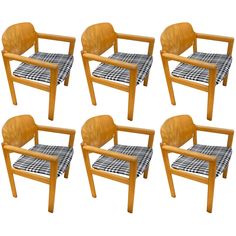 six wooden chairs with checkered seat covers on each one and the other side, set of four